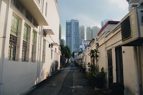 back alley with a view of skyscrapers